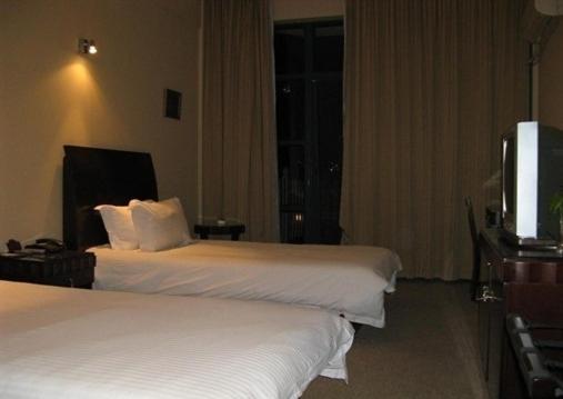 שנגחאי Baolong Homelike Hotel - Wusong Branch חדר תמונה